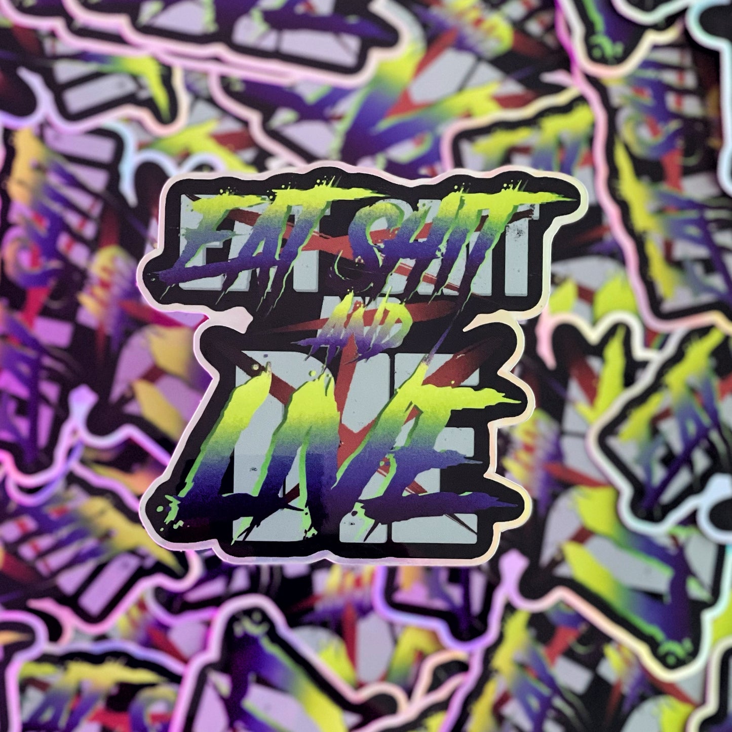 a sticker depicting the best live from an 80's slasher movie ever.. eat shit and die ? no eat shit and live ricky.